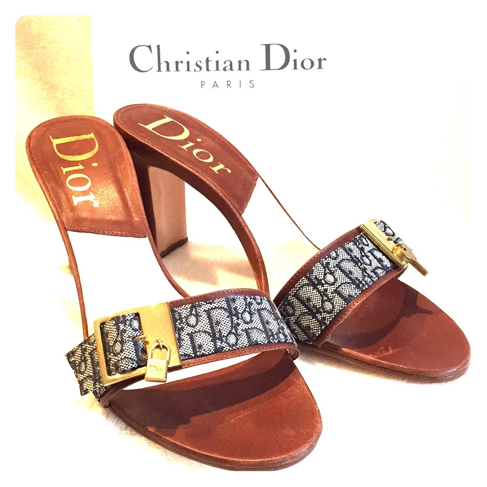 Dior mules.  Blue logo and gold hardware.